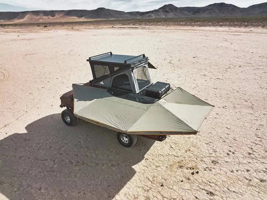 270-degree free-standing awning on a vehicle in a desert landscape.