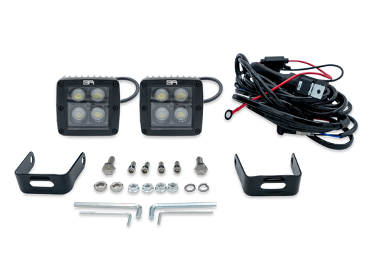BLACKOUT LED CUBE FLOOD LIGHT with mounting kit, wiring harness, and accessories.