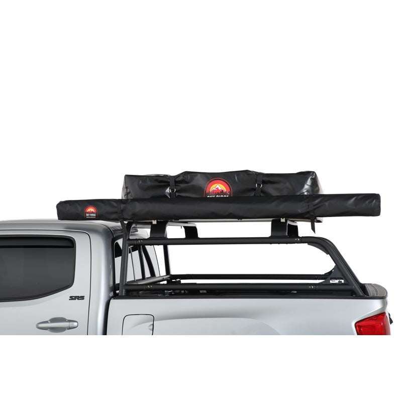 SKY RIDGE 6.5' AWNING mounted on a truck roof rack, offering durable shade and weather protection for outdoor adventures.