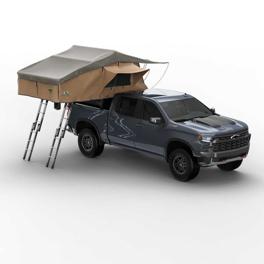 Elite rooftop tent with annex room, accommodates 4-5 people, tan color, mounted on a truck with dual ladders.