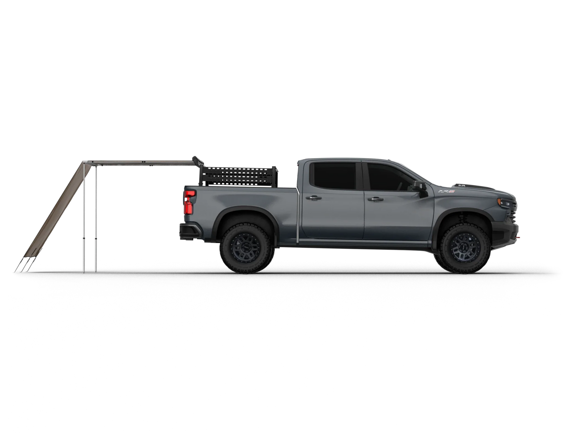 TUFF STUFF® Overland Awning Shade Wall attached to a vehicle, providing extended shade and privacy for outdoor activities.