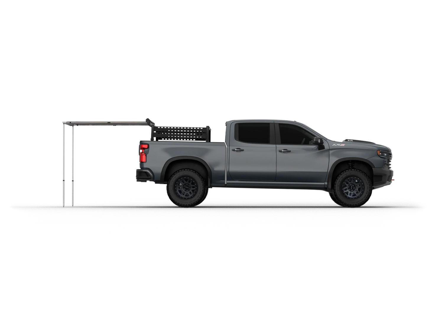TUFF STUFF® Overland Roof Top Awning 4.5′ x 6′ installed on a grey truck, providing outdoor shade.