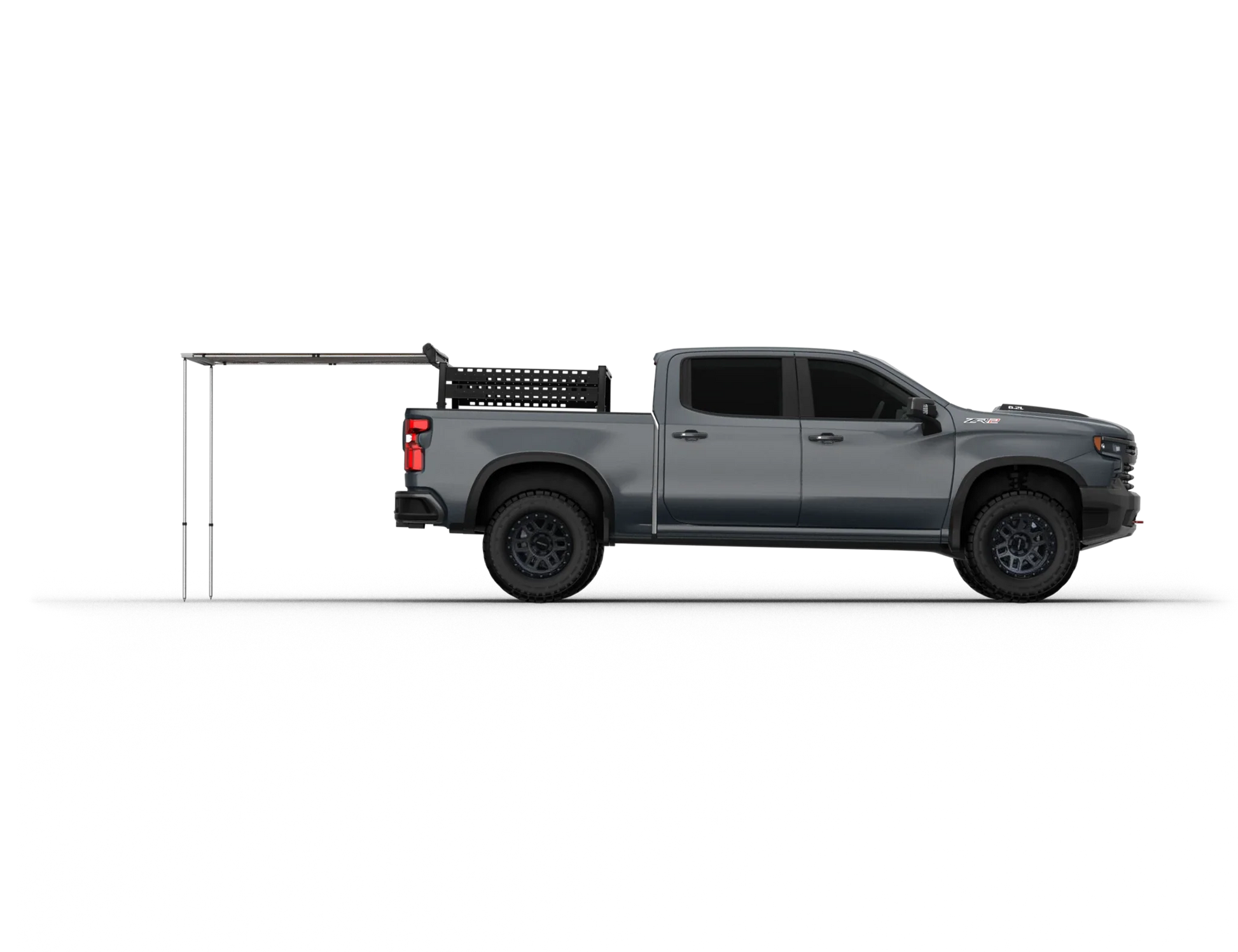 TUFF STUFF® Overland Roof Top Awning 4.5′ x 6′ installed on a grey truck, providing outdoor shade.