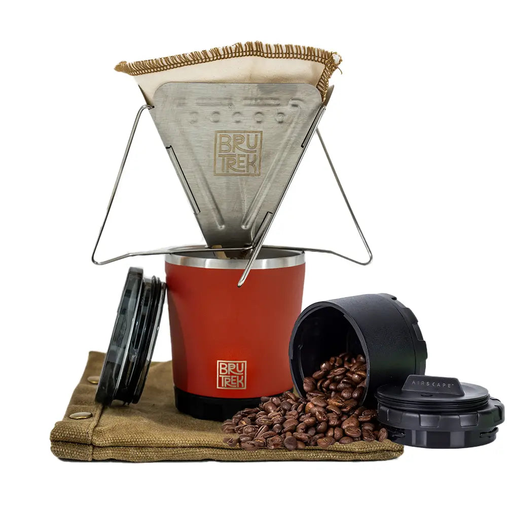 Collapsible stainless steel coffee pour over set with reusable filter and wax bag for outdoor brewing.