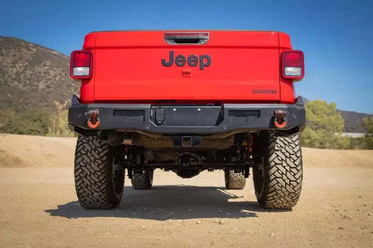 2019-2024 Jeep Gladiator JT with heavy-duty rear bumper displayed outdoors.