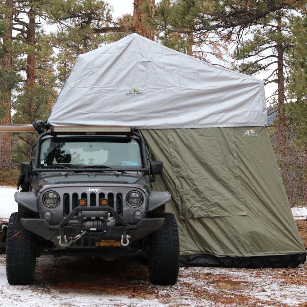 Tuff Stuff® Overland Roof Top Tent with Xtreme Weather Cover in outdoor setting.