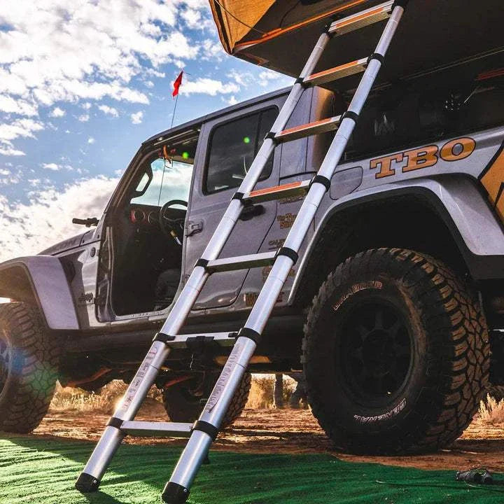 Tuff Stuff® Overland Roof Top Tent Telescoping Extension Ladder on SUV.
