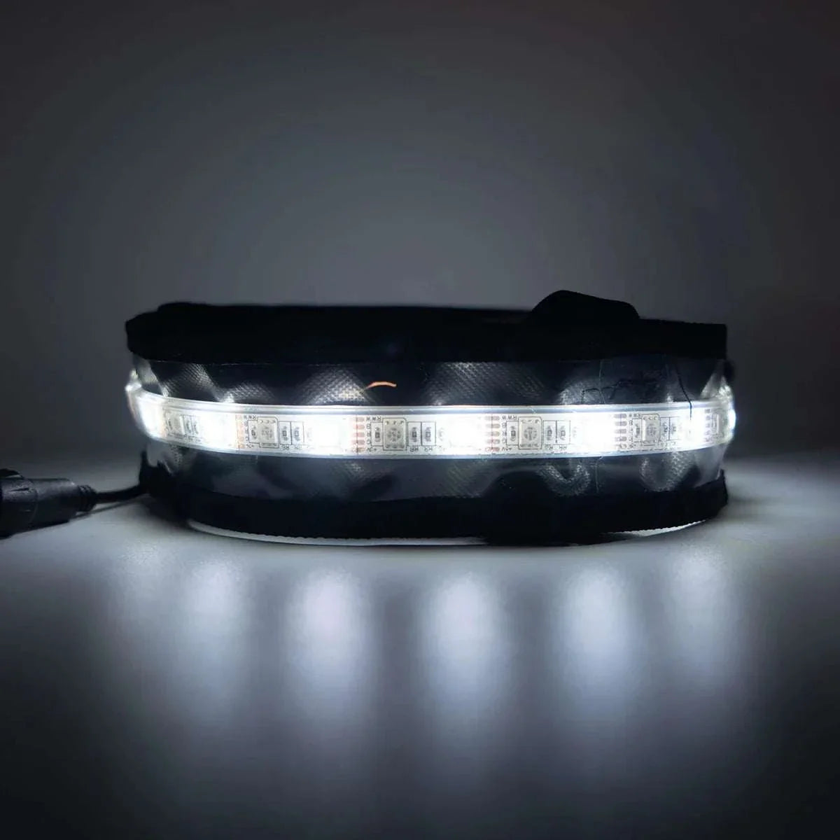 TUFF STUFF® Overland LED Light Strip USB for roof top tent, dual-color amber/white illumination.