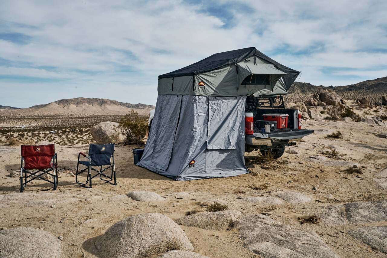 SKY RIDGE PIKE 3 ANNEX ROOM set up at campsite with chairs, showcasing spacious interior and durable design.