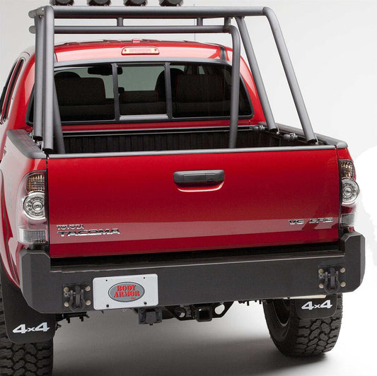 2005-2015 Toyota Tacoma rear bumper, rugged black steel design for off-road durability.