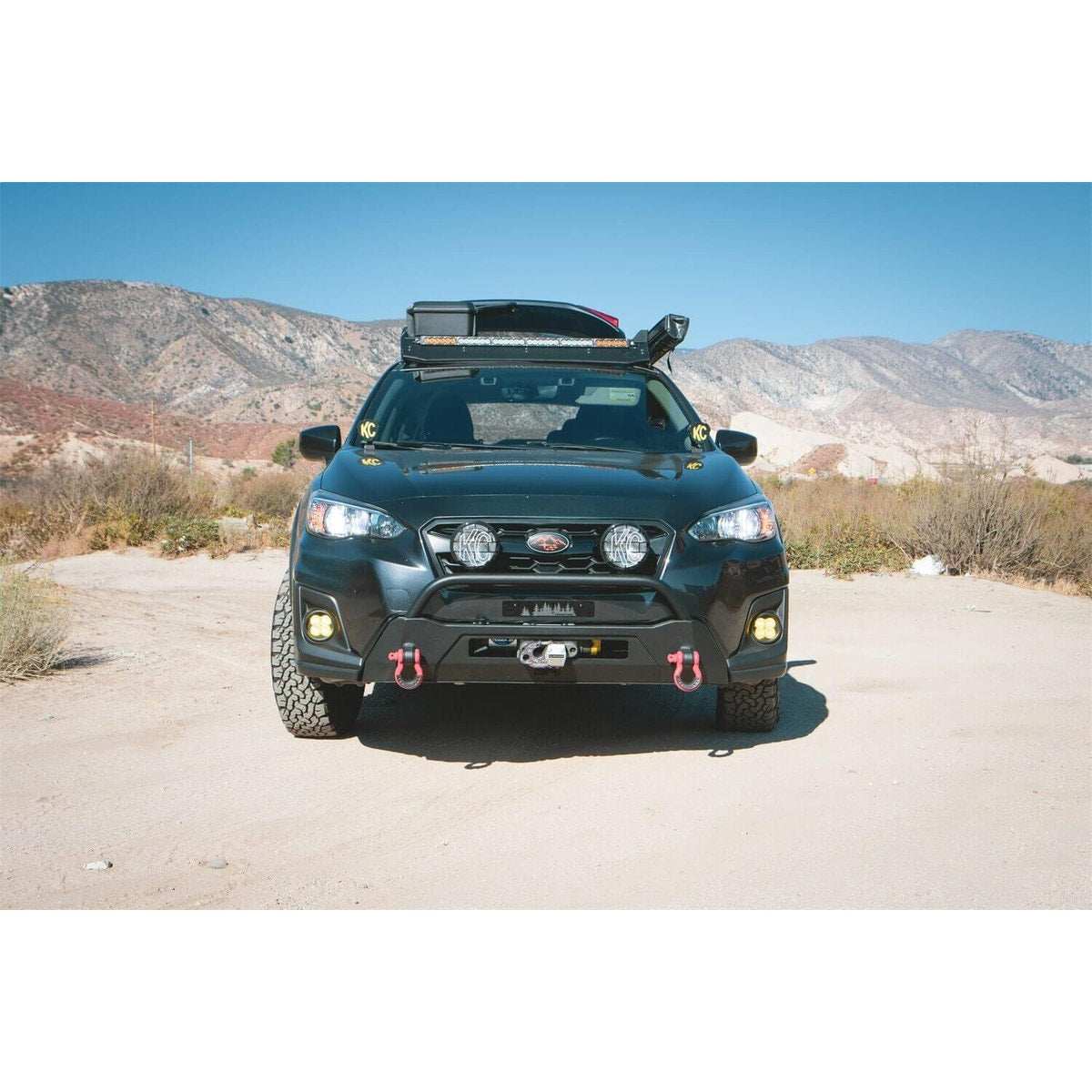 2018-2023 Subaru Crosstrek with Hiline Front Winch Bumper on rugged terrain.