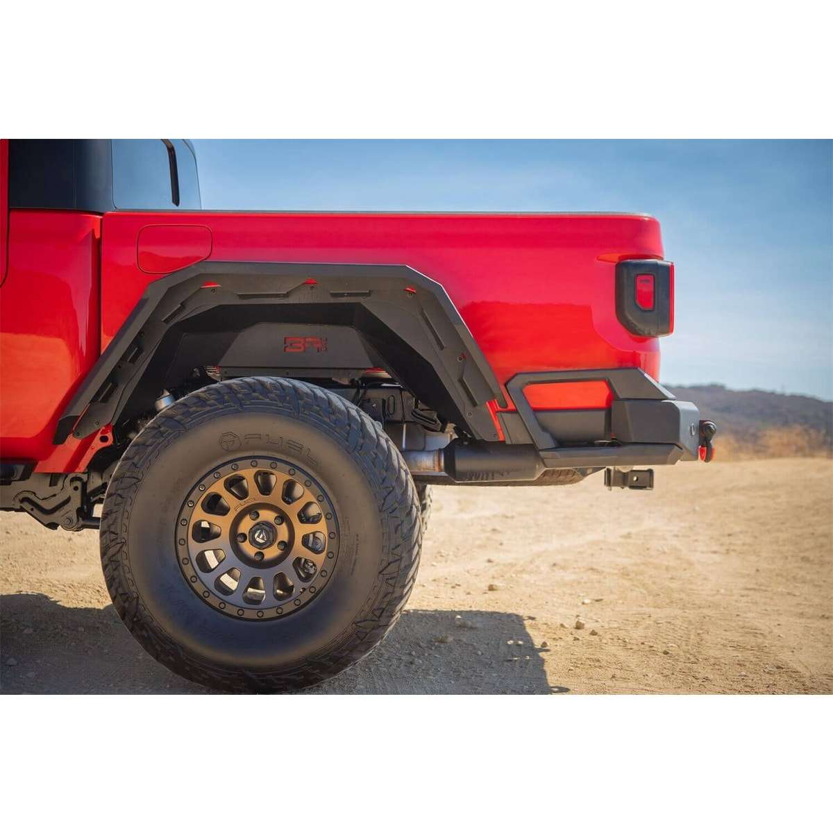 Red 2019-2024 Jeep Gladiator JT with bed protector for bumpers JT-5100 and JL-2965, protecting against scratches and dents.