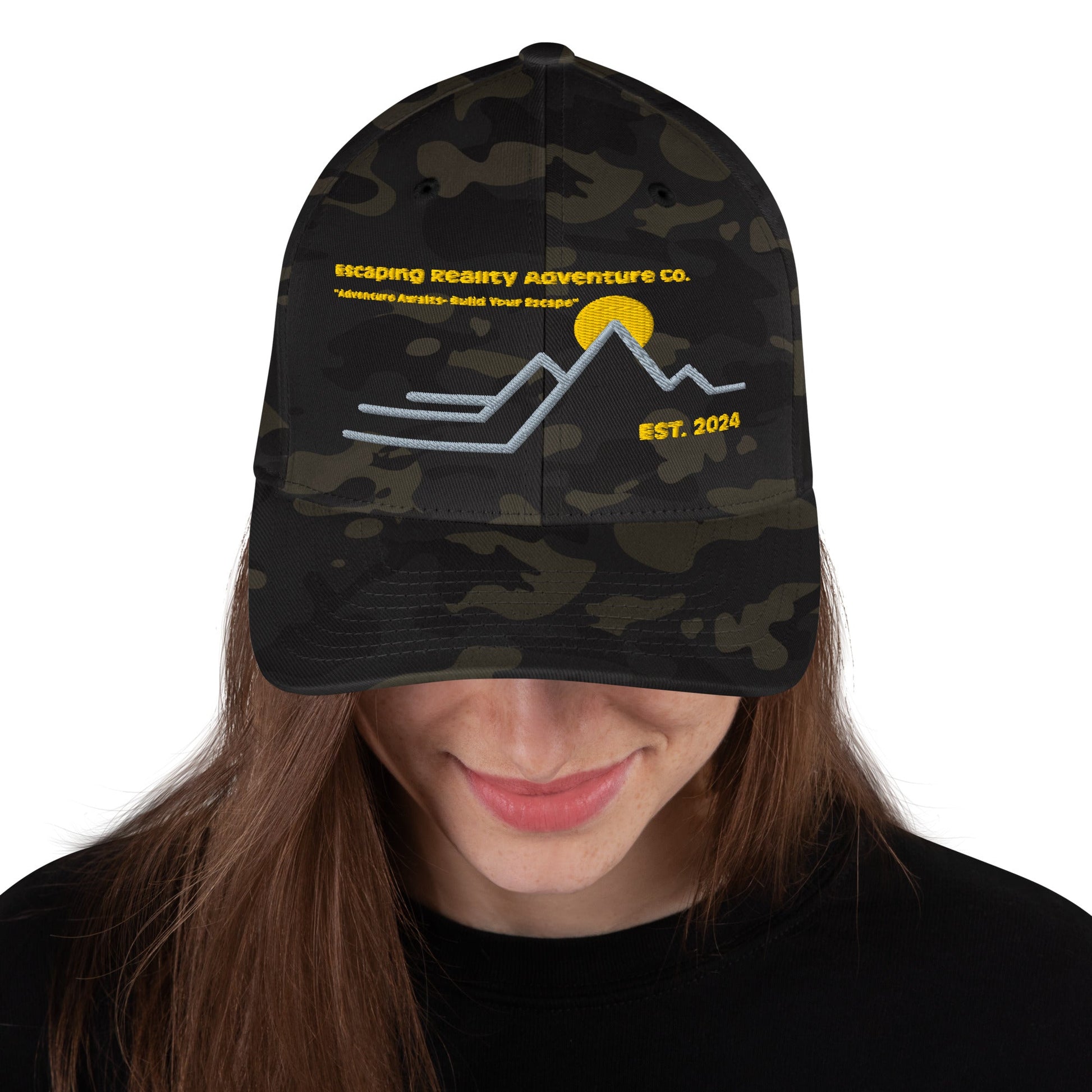 Camouflage ERA Co. Flex Cap with mountain design and yellow accents.