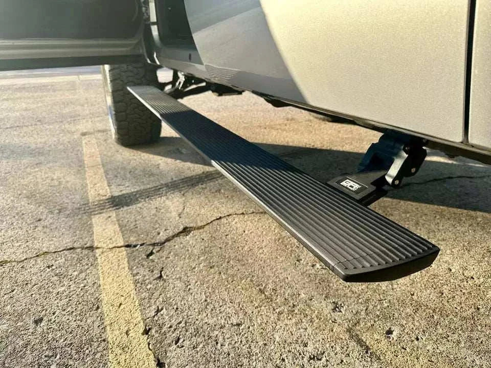 2019-2024 Chevrolet Silverado/GMC Sierra Crew Cab E-Power Board Steps with LED lighting and durable aluminum construction.