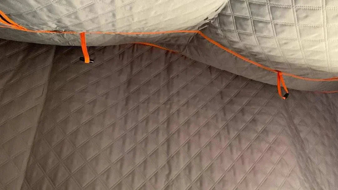 TUFF STUFF® OVERLAND ALPHA™ II roof top tent insulation liner showcasing quilted poly cotton interior.