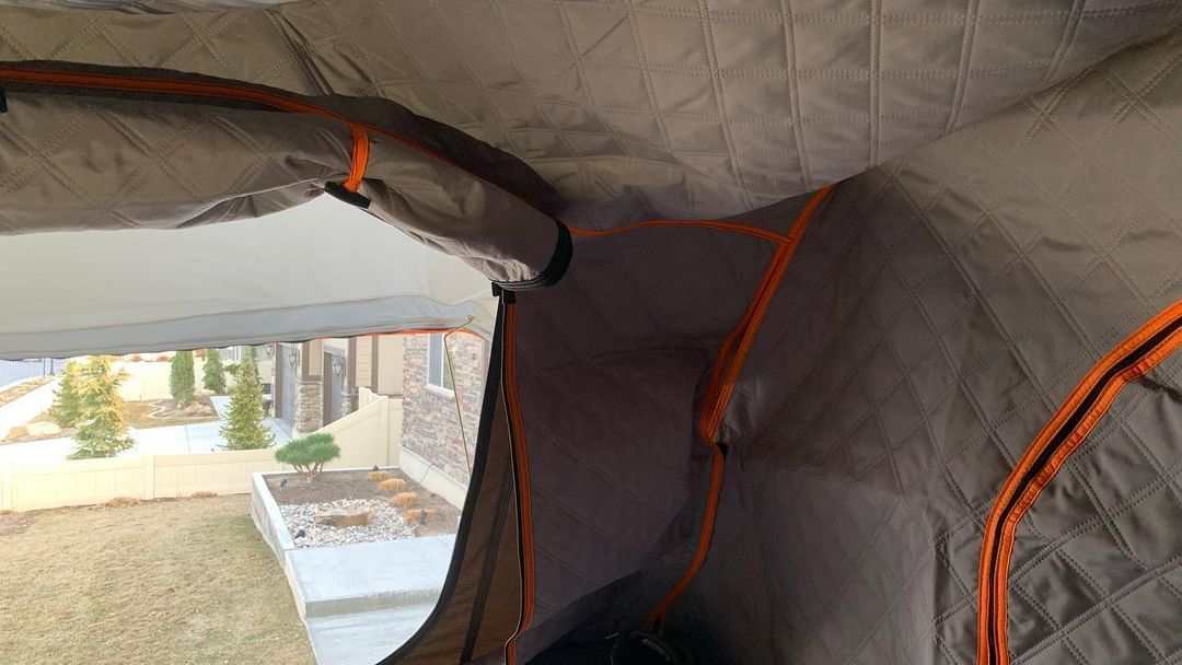 TUFF STUFF® OVERLAND ALPHA™ II Roof Top Tent Insulation Liner interior view, showcasing quilted double-layered poly cotton construction with zippered compatibility for enhanced insulation and ventilation.