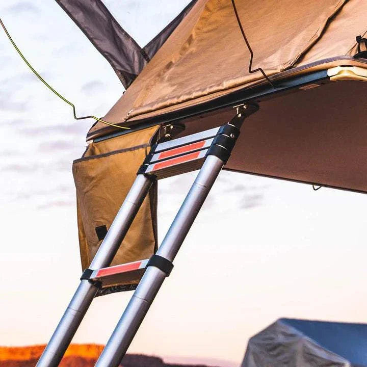 Tuff Stuff® Overland Roof Top Tent Telescoping Extension Ladder, 97 Inch, installed on a tent for enhanced access.