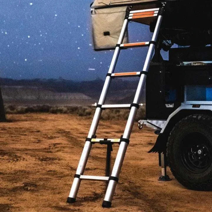 TUFF STUFF® Overland Roof Top Tent Telescoping Extension Ladder, 97 in setup in outdoor camping scene.